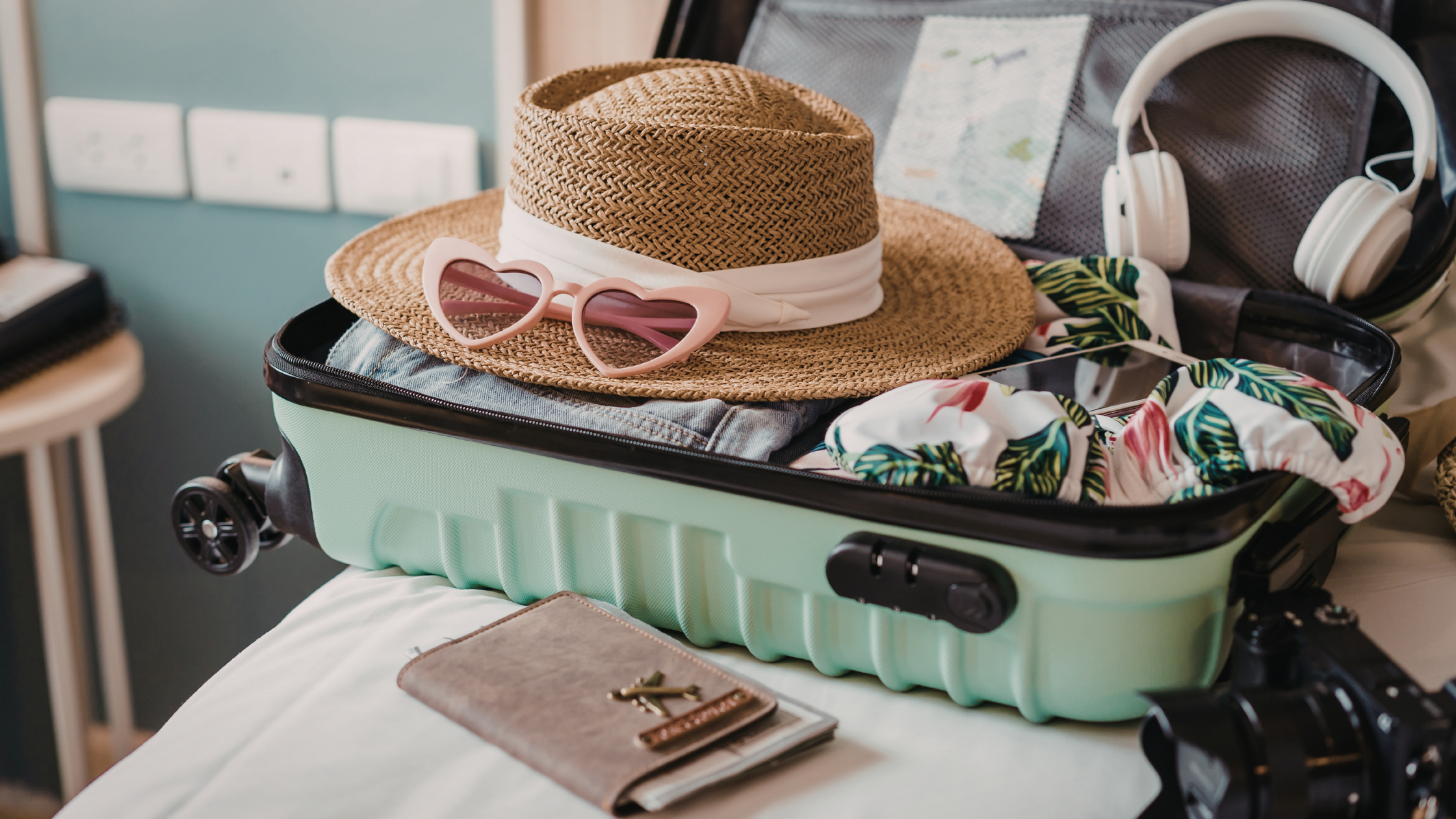 organized suitcase with travel essentials for international travel packing tips